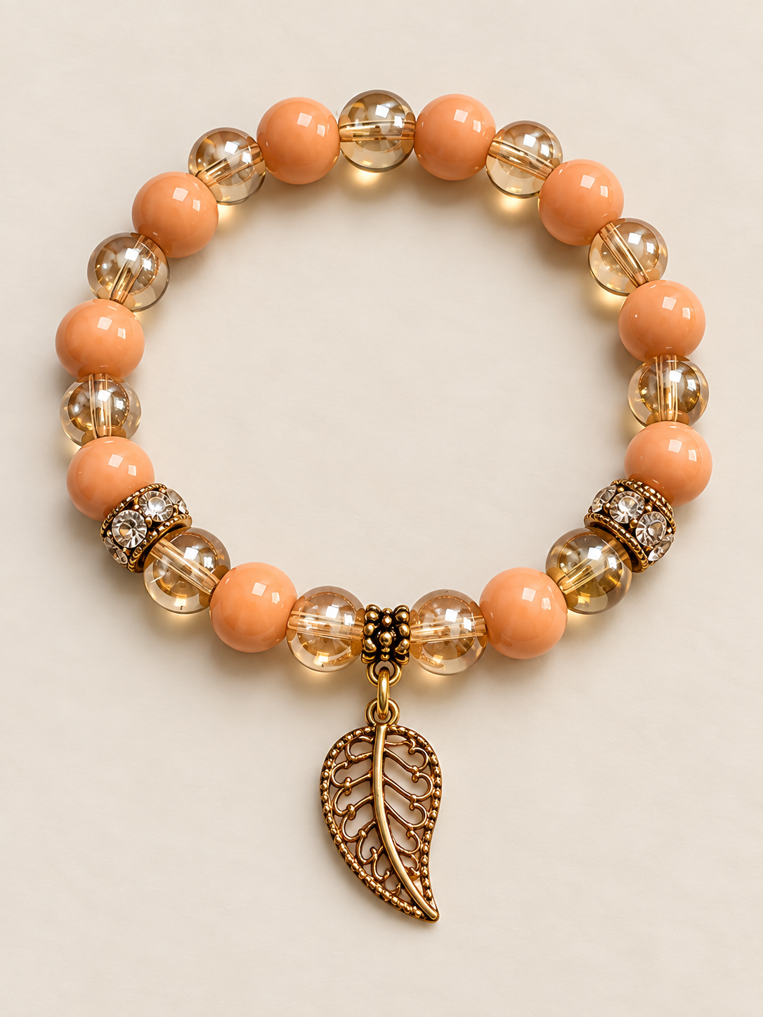 Peachy Grace Stretch Bracelet – Peach, Champagne & Gold with Leaf Charm